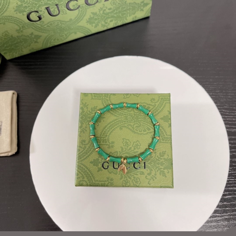 G*u*i bracelets